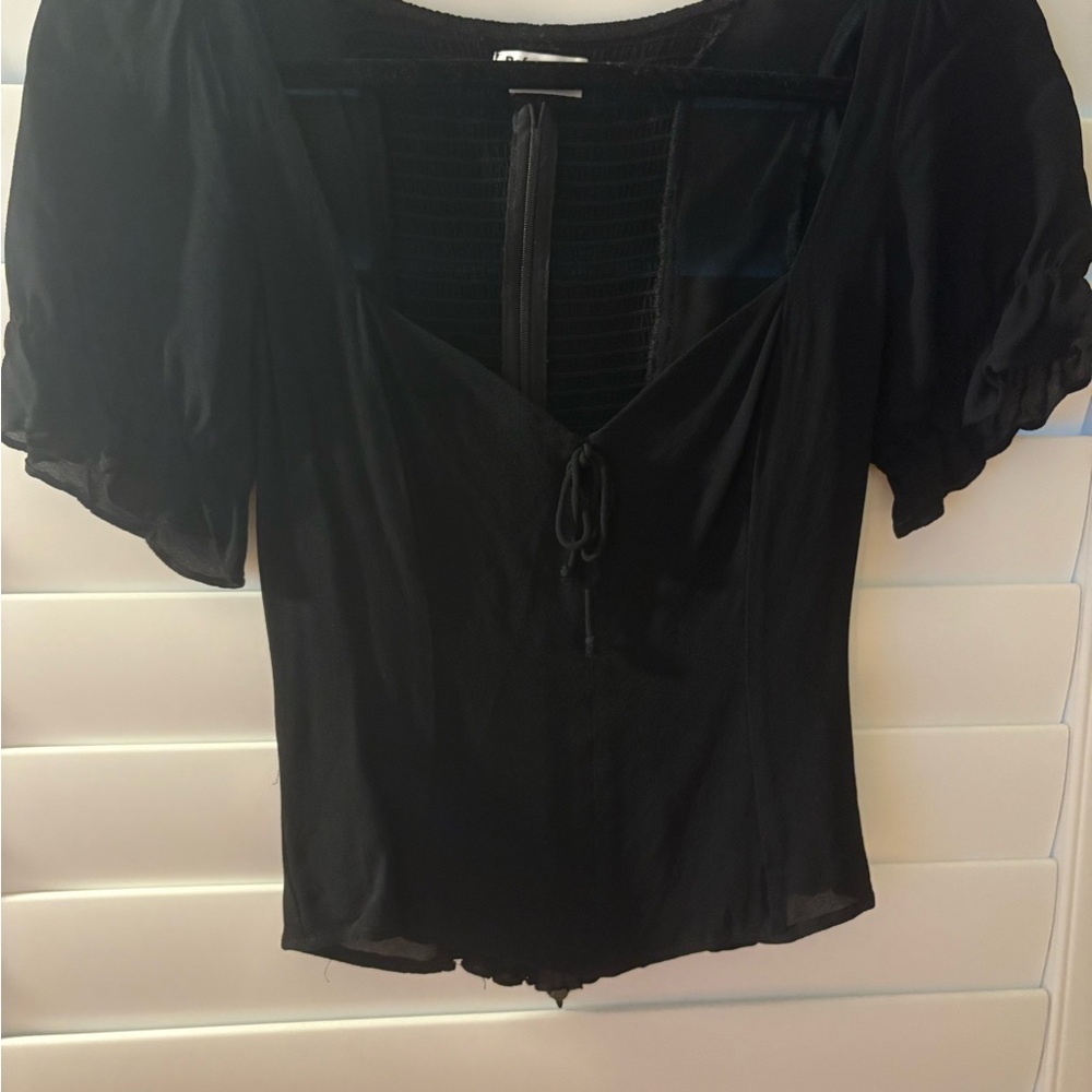 Reformation size 6 black ruffle sleeve blouse